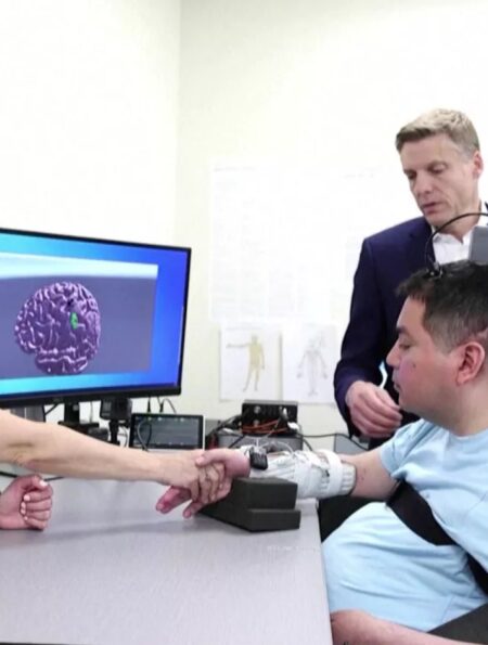 A Leap Forward in Neuroprosthetics: AI and Implants Empower Paralyzed Man